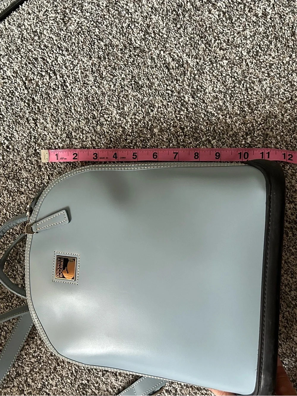 Dooney & Bourke “Pod Backpack” light blue